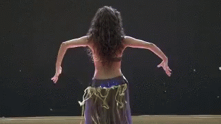 Nudist teens practicing belly dancing
